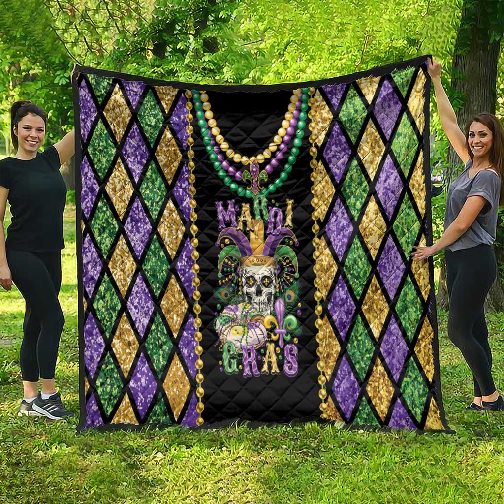 Mardi Gras quilt blanket featuring colorful bead garland trim and fleur de lis skull art