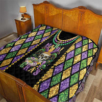 Mardi Gras quilt blanket with purple and green diamonds, gold accents, and skull graphic