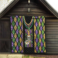 Mardi Gras quilt blanket with bead trim and purple-green diamond pattern on black backing
