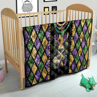Mardi Gras quilt blanket with diamond border pattern, bead garland, and skull fleur de lis