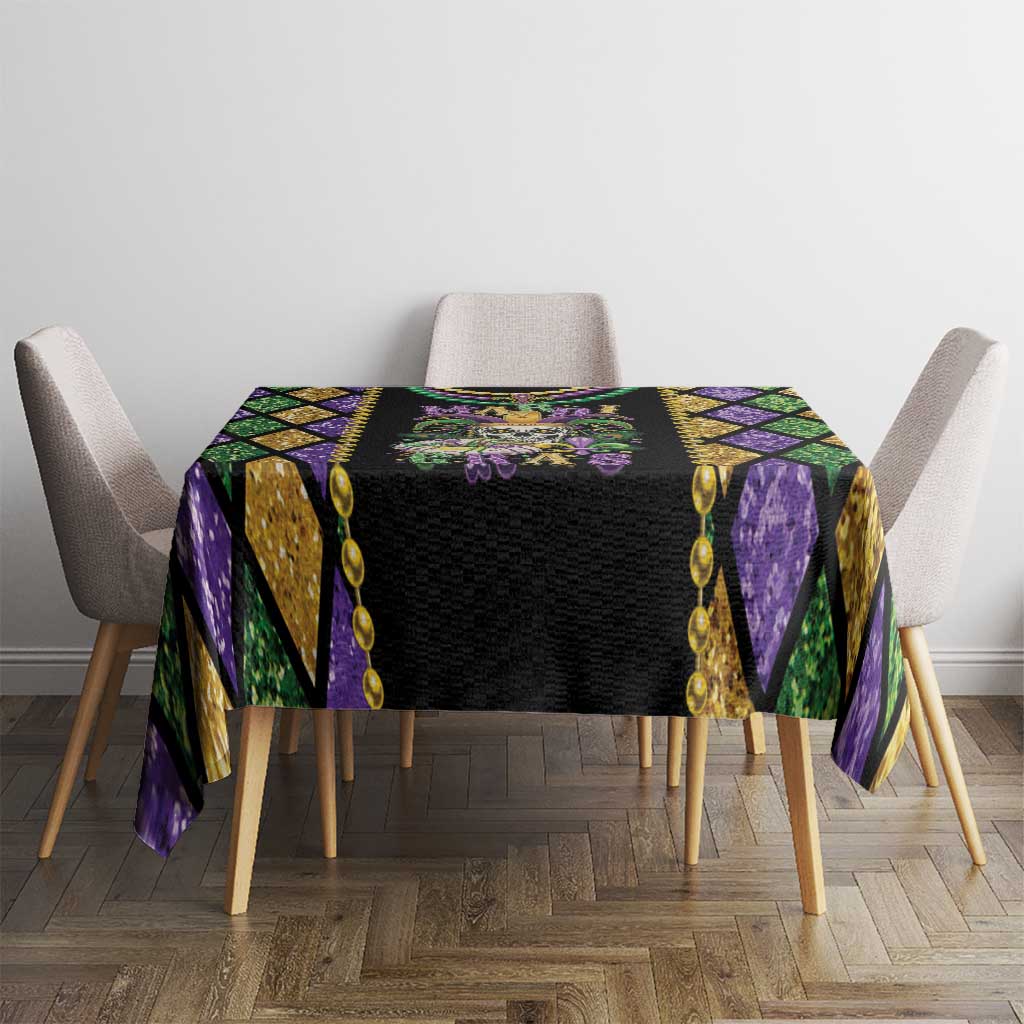 Multicolor Mardi Gras tablecloth with black center panel and purple, green, and gold diamond design