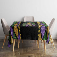 Multicolor Mardi Gras tablecloth with black center panel and purple, green, and gold diamond design