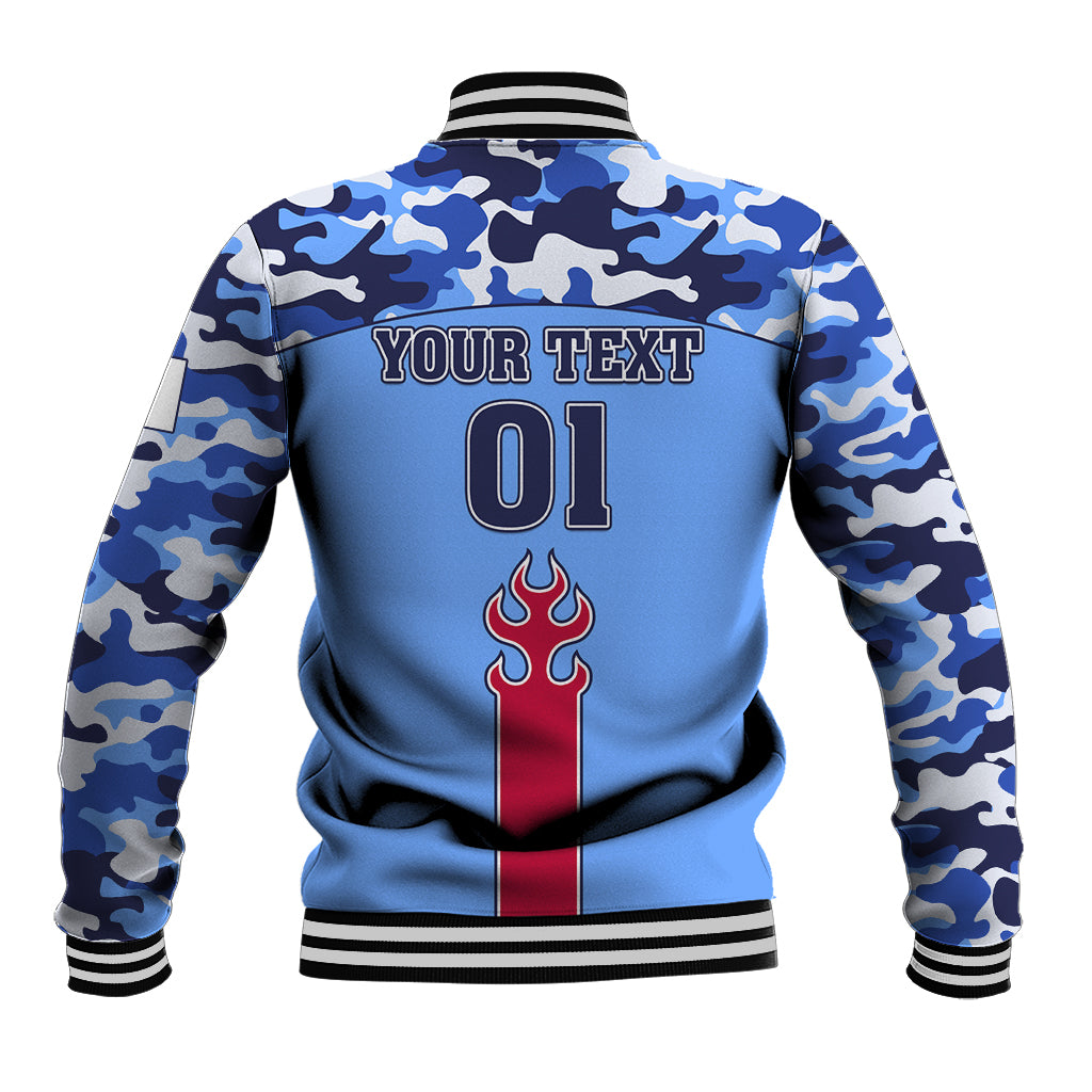 Blue camo varsity jacket back with striped rib hem, YOUR TEXT 01, and flame emblem