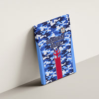 Framed blue camouflage canvas wall art, tilted, with Samurai Blue lettering and flame crest