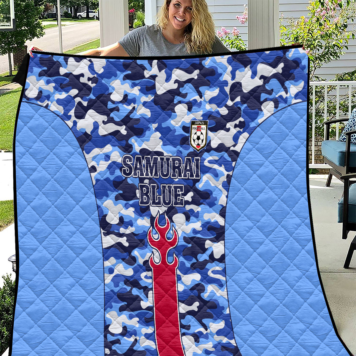 Japan football quilt in blue camouflage with Samurai Blue text and crest, quilted throw blanket