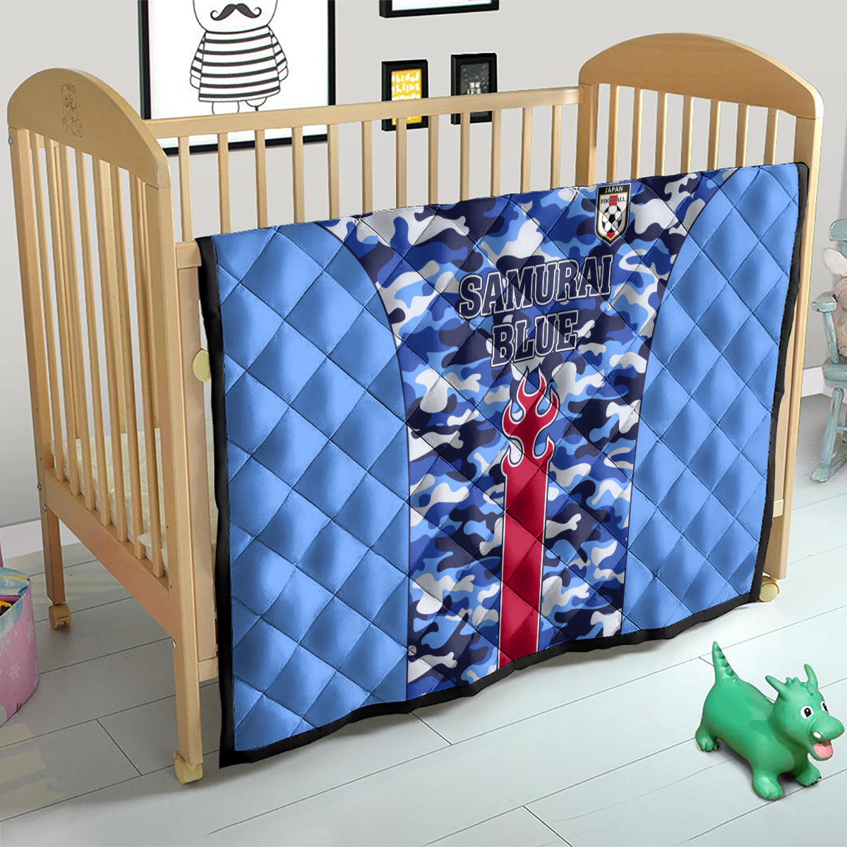 Japan football quilt in a crib, blue camouflage with Samurai Blue logo and crest patch