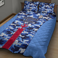 Blue camouflage quilt bed set with red crest and diagonal red stripe, matching pillows