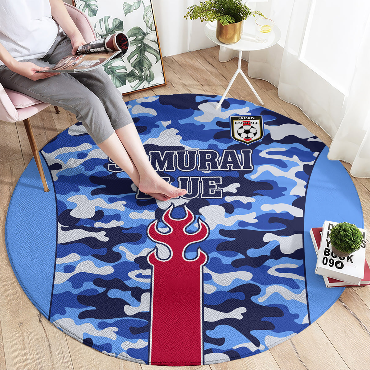 Round blue camouflage area rug with 'SAMURAI BLUE' lettering and central flame crest