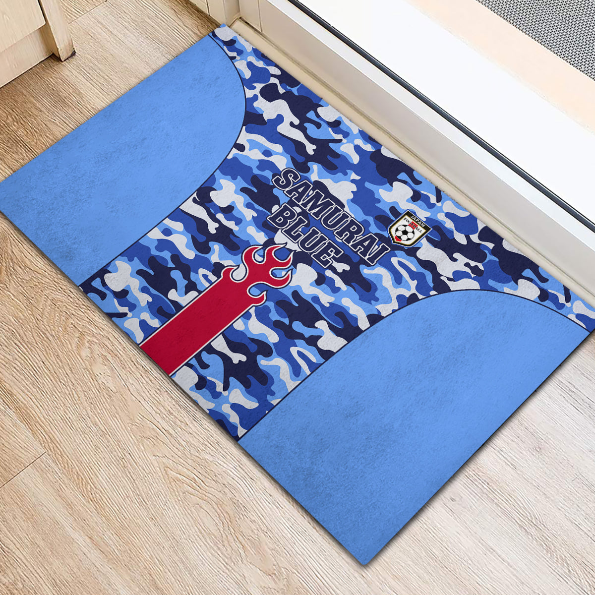 Blue rubber doormat with blue camo pattern and “Samurai Blue” crest in center