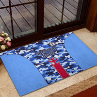 Blue camouflage rubber doormat with “Samurai Blue” lettering and red trident stripe