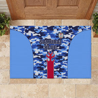 Blue rubber doormat featuring “Samurai Blue” and shield badge in camouflage
