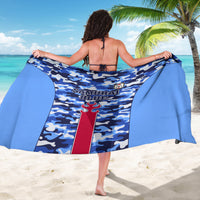 Blue camouflage sarong with “SAMURAI BLUE” print and crest, draped across back