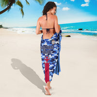 Blue camouflage sarong with “SAMURAI BLUE” text, flame sword graphic, tied knot