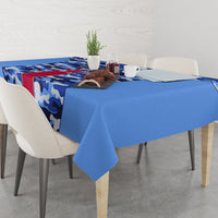 Blue camouflage tablecloth with red stripe along table edge