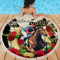 Round beach blanket with horse rider and “Kentucky Derby” logo amid floral roses, white fringe