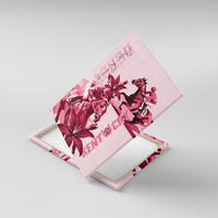 Pink horse racing canvas wall art angled view, showing jockey and lily blooms