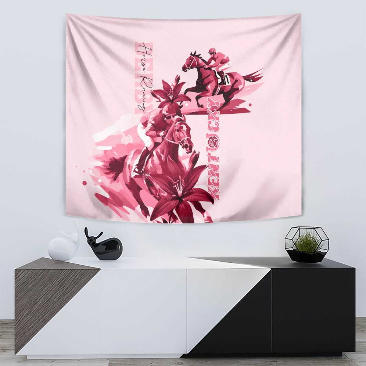 Pink horse racing tapestry with red horse and rider, lily-like flowers and vertical lettering