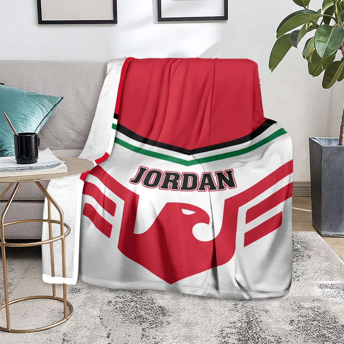 Red and white football blanket with Jordan logo on living room floor
