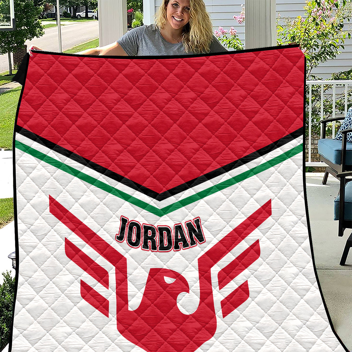 Football quilt in red and white with green stripes and Jordan crest, diamond stitched