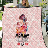 Pink diamond-quilt blanket with mom-and-baby graphic and 'Est. 2024' text.