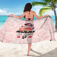 Pink rose-print sarong with “Mommy Est. 2024” lettering and paw-logo graphic