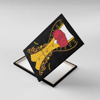Framed black canvas wall art angled view with red bow, yellow suit, and gold ornamental trim