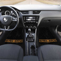 Car floor mats with black base and gold ornate border, placed on front footwells