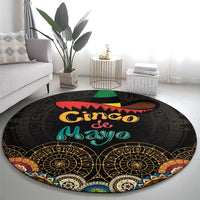 Black round decorative carpet with sombrero and 'Cinco de Mayo' text, ornate border