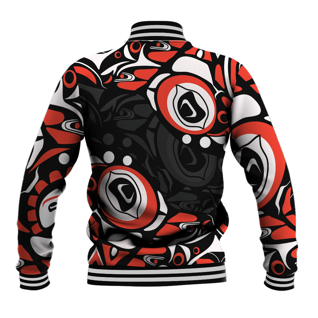 Unisex black baseball jacket with red and white Haida-style graphic pattern, ribbed cuffs