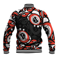 Unisex black baseball jacket with red and white Haida-style graphic pattern, ribbed cuffs