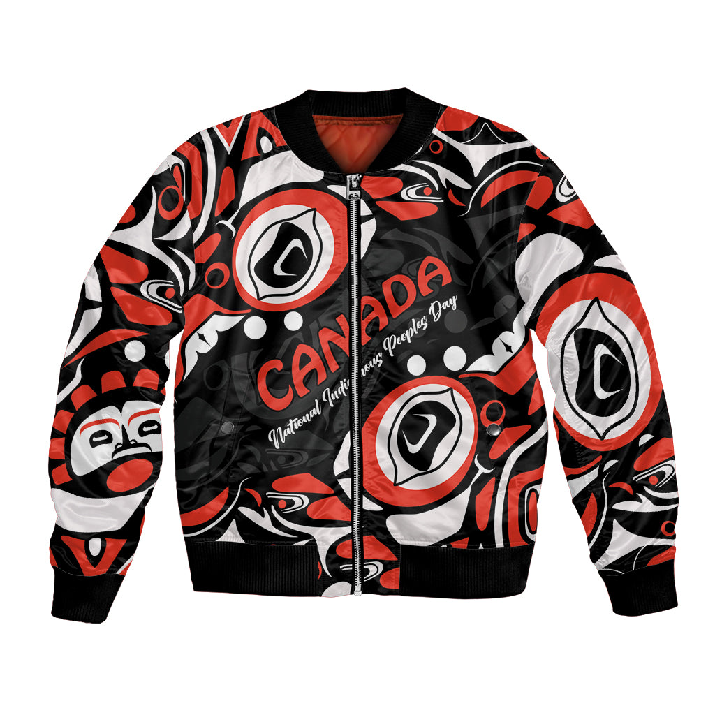 Unisex bomber jacket in black with red and white Haida-style circle pattern, front zip