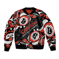 Unisex bomber jacket in black with red and white Haida-style circle pattern, front zip