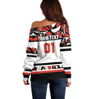 Off-shoulder sweater, white with red and black sports graphic and OT print on back
