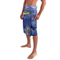 Blue knee-length board shorts with mountain print and yellow flower graphic on leg