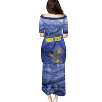 Blue short-sleeve long dress, back view, with scenic landscape and yellow floral graphic print
