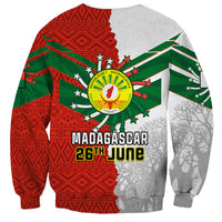 Unisex sweatshirt with Madagascar 26th June graphic, emblem, and red-green pattern sleeves