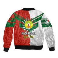 Unisex bomber jacket with green, red, and white Madagascar emblem and back text