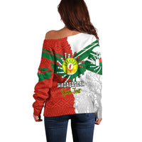 Back view off-shoulder sweater with red, green, and white Madagascar graphic print
