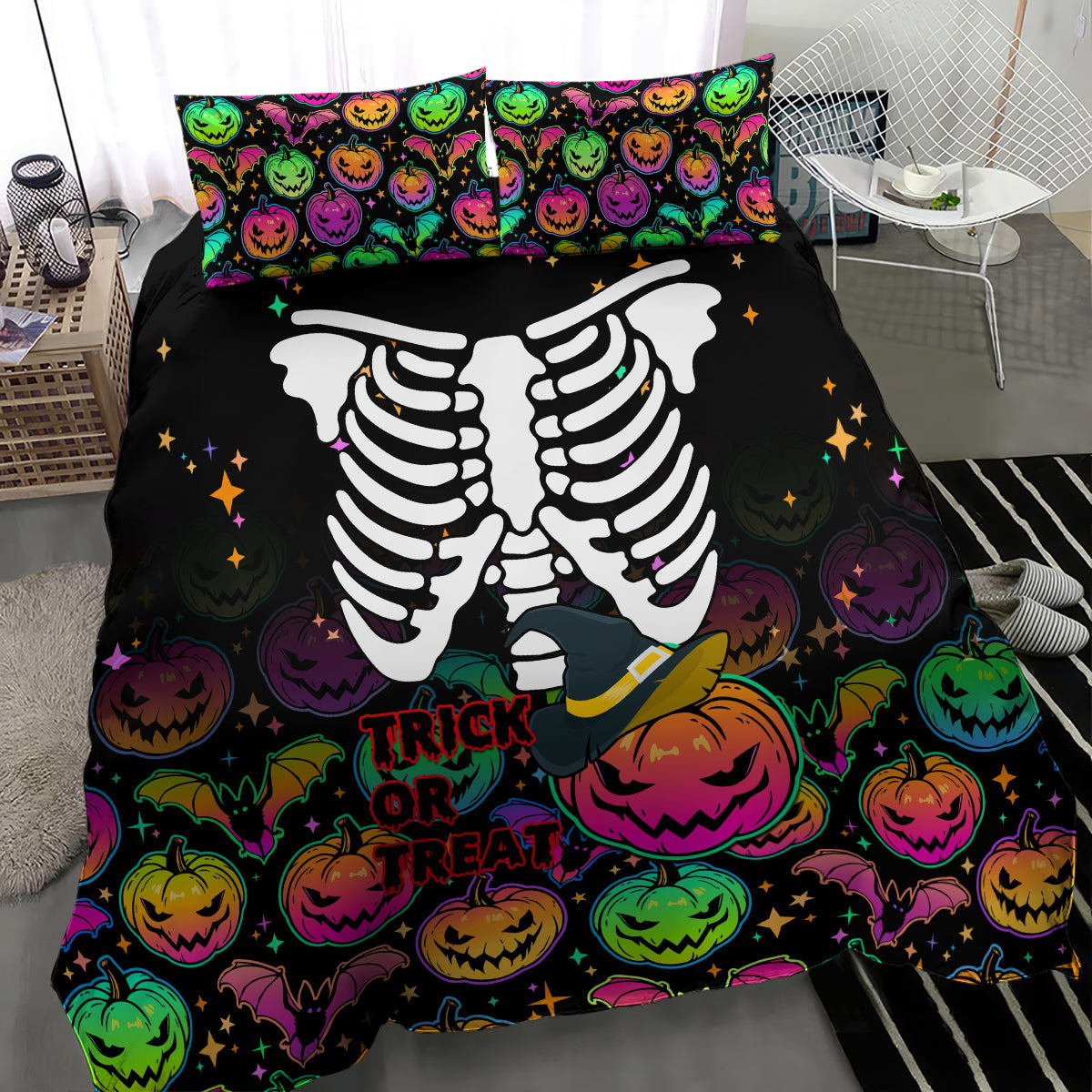 Black Halloween duvet with skeleton arms, colorful pumpkins, and Trick or Treat text