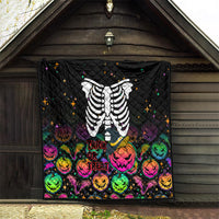 Black Halloween skeleton quilt hanging outdoors with colorful pumpkin and star designs