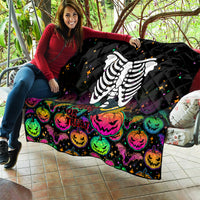 Black Halloween skeleton quilt on patio with colorful pumpkins and multicolor 'Trick or Treat'