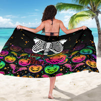 Black sarong featuring white skeleton back graphic with colorful jack-o'-lanterns