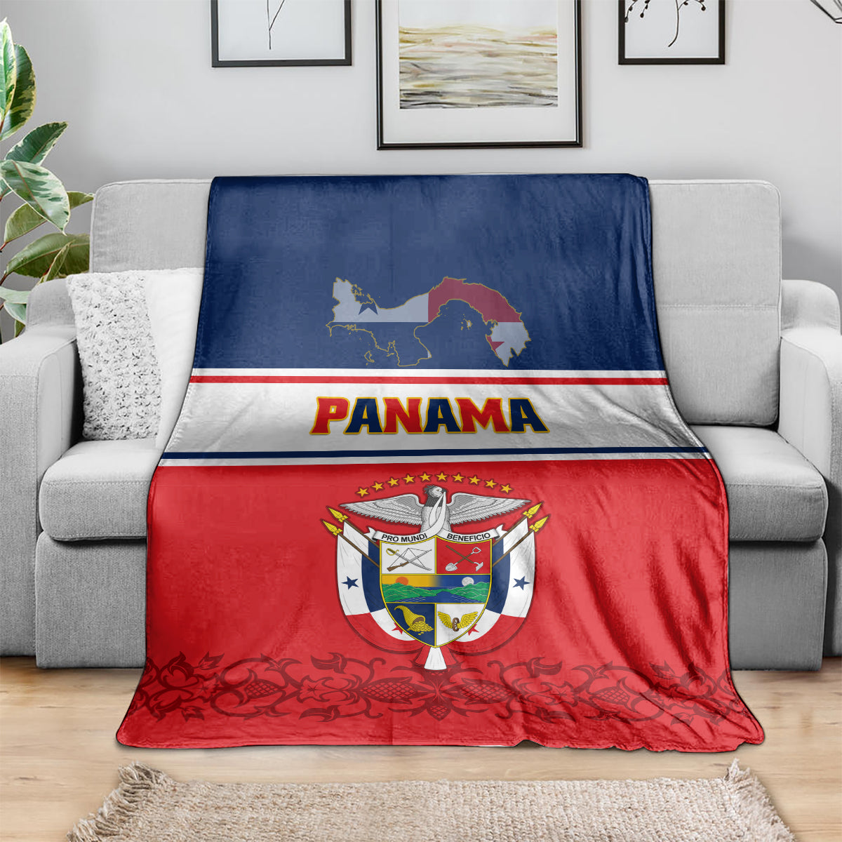 Panama-themed blanket coat draped over sofa, showing Panama text, map, coat of arms stripes