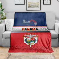 Panama-themed blanket coat draped over sofa, showing Panama text, map, coat of arms stripes