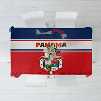 Red tablecloth with blue-and-white stripes and central coat of arms graphic