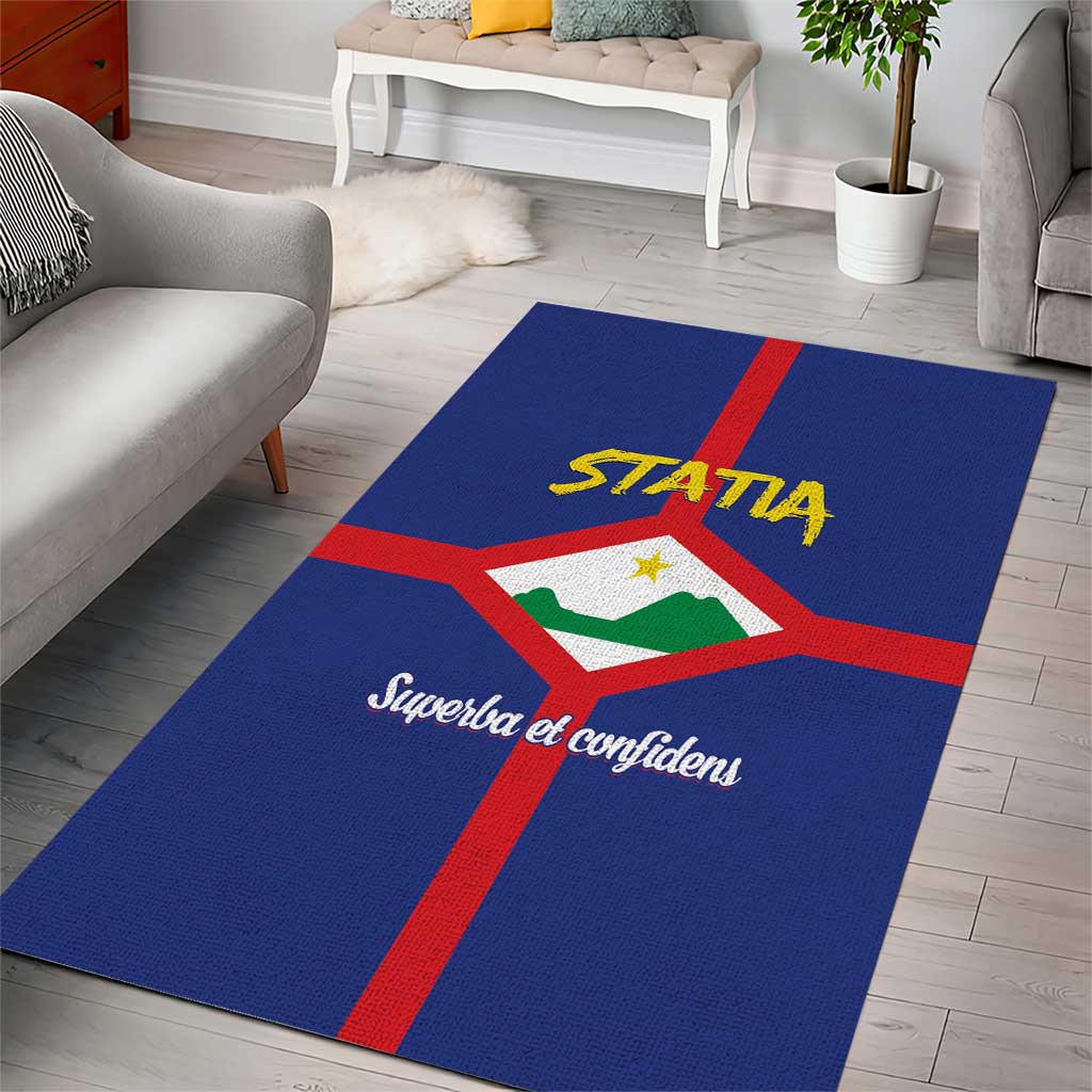 Blue area rug laid in living room, red cross stripe and STATIA logo