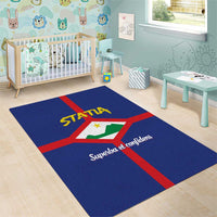 Blue area rug in kids room with red cross, STATIA crest and slogan