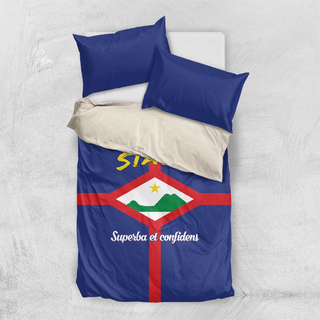 Blue duvet with STATIA crest and two blue plus one white pillows