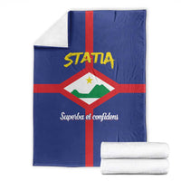 Folded blue coat of arms blanket with red cross and "Superba et confidens" text