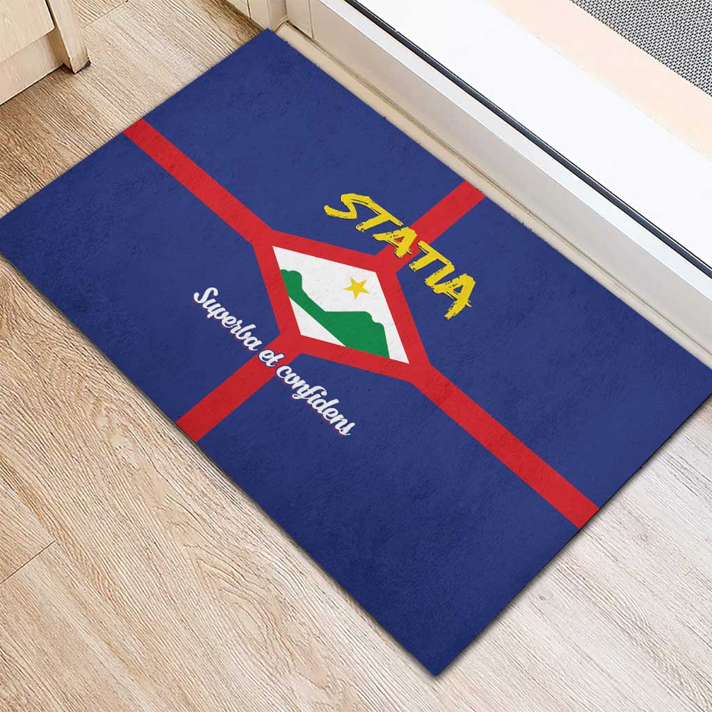 Blue rubber doormat corner view with coat of arms, STATIA and "Superba et confidenti"